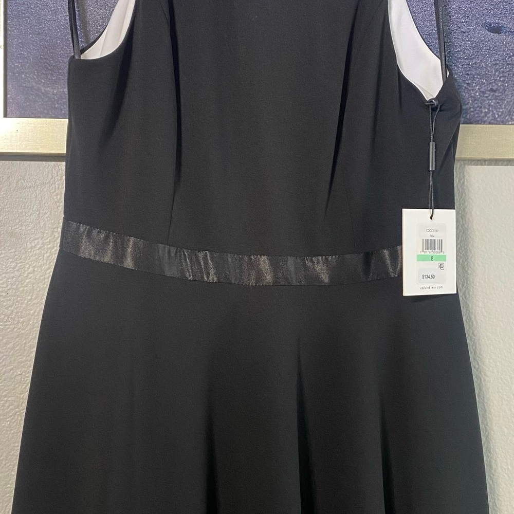 Calvin Klein Elegant Black Strapless Dress with White Trim
